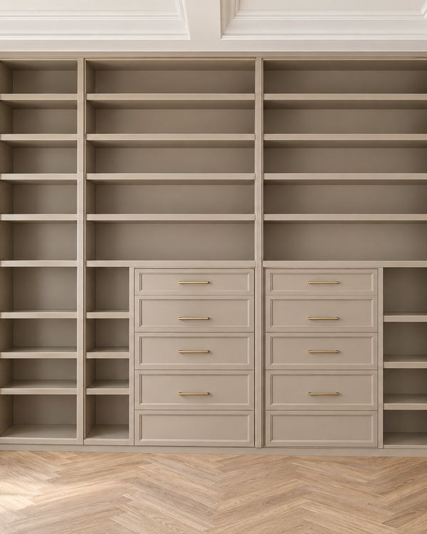 Library wall design shown in greige, with adjustable shelves around two banks of drawers
